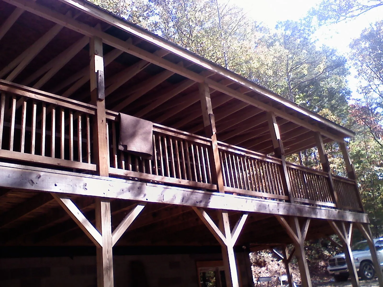 Timber framing under a new elevated porch and deck — Roof Leak Repair in Leeds by Roofing Brothers
